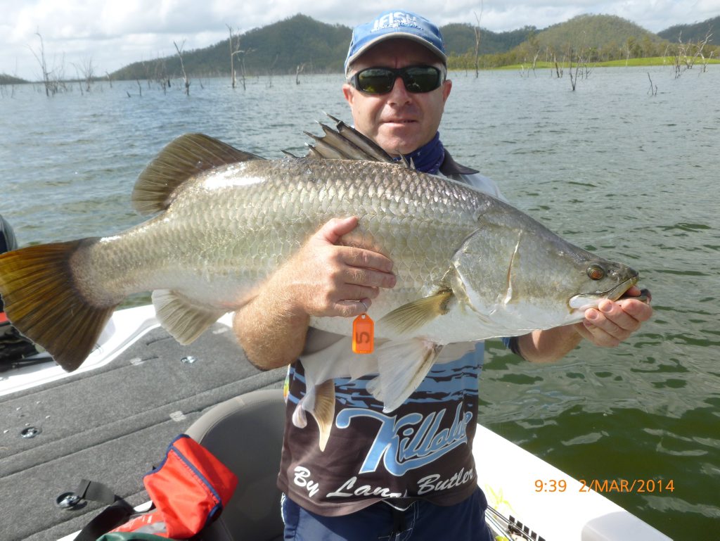 Paul Butler holds a 104cm barramundi caught at Teemburra Dam. Photo Contributed Paul Butler holds a 104cm barramundi caught at Teemburra Dam. Photo Contributed